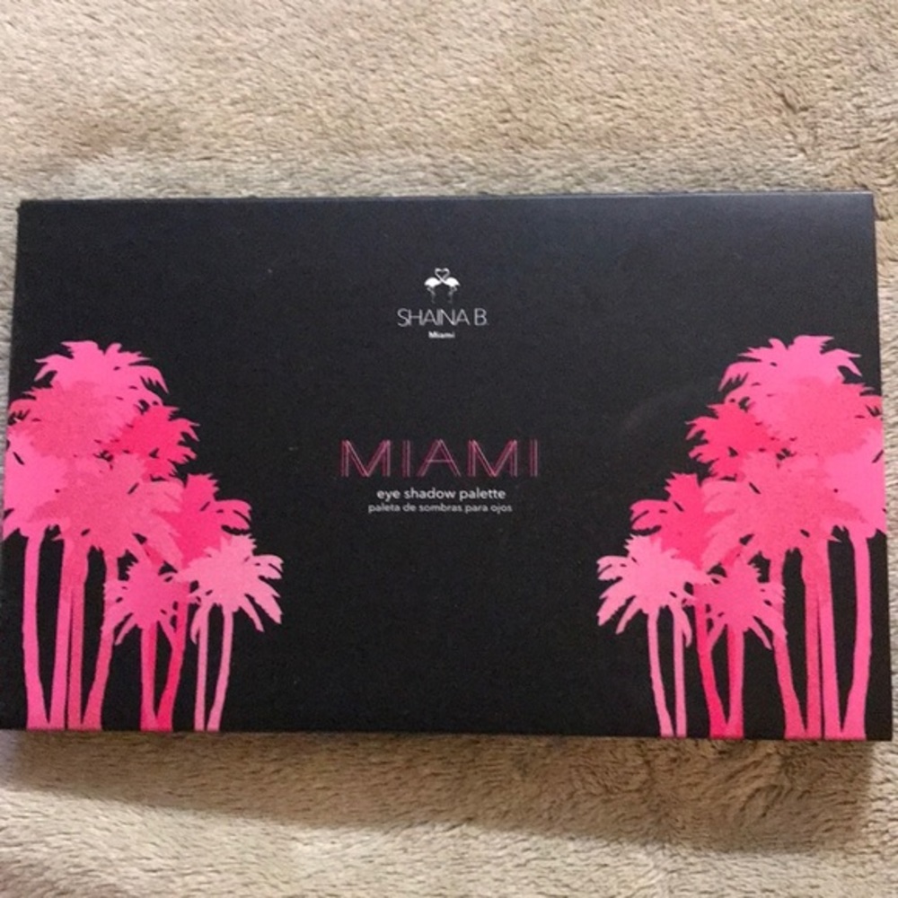 Miami eye shadow pallet, 4 metallic & 4 matte. New in package, never used.
